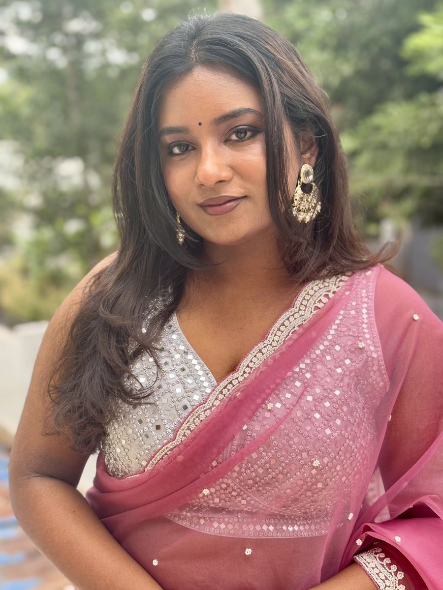 Charuta in a pink saree